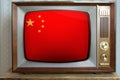 Old tube vintage TV with the national flag of China on the screen, the concept of eternal values Ã¢â¬â¹Ã¢â¬â¹on television, global world